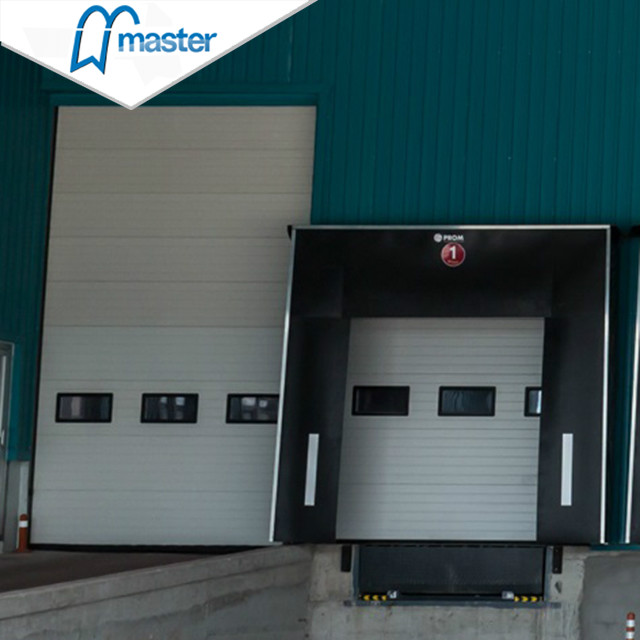 Electrical Wind Proof Steel Timber Vertical Lift Industrial Doors with Entrance 